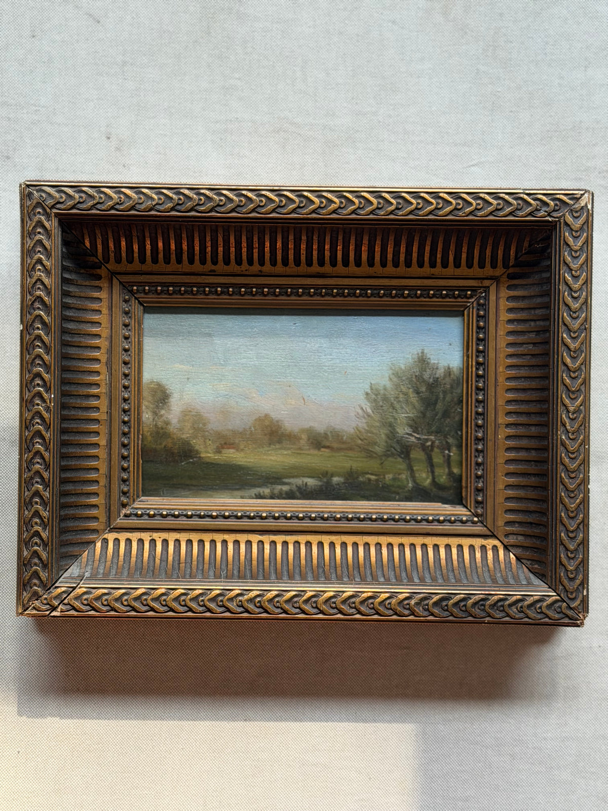 Antique French Oil on Panel Landscape in Carved Giltwood Frame