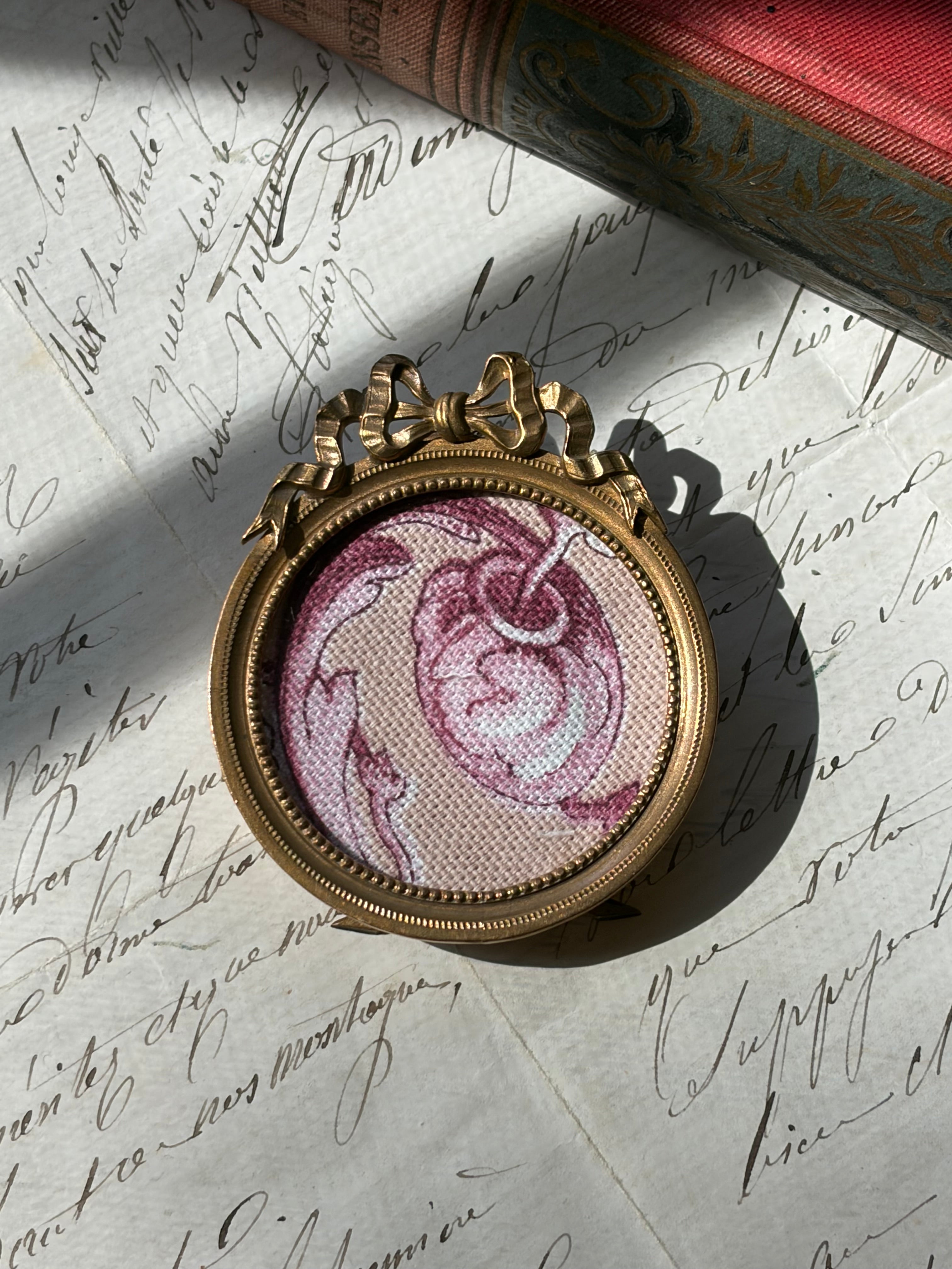 Antique French Gilt Brass Oval Frame with Bow Crest