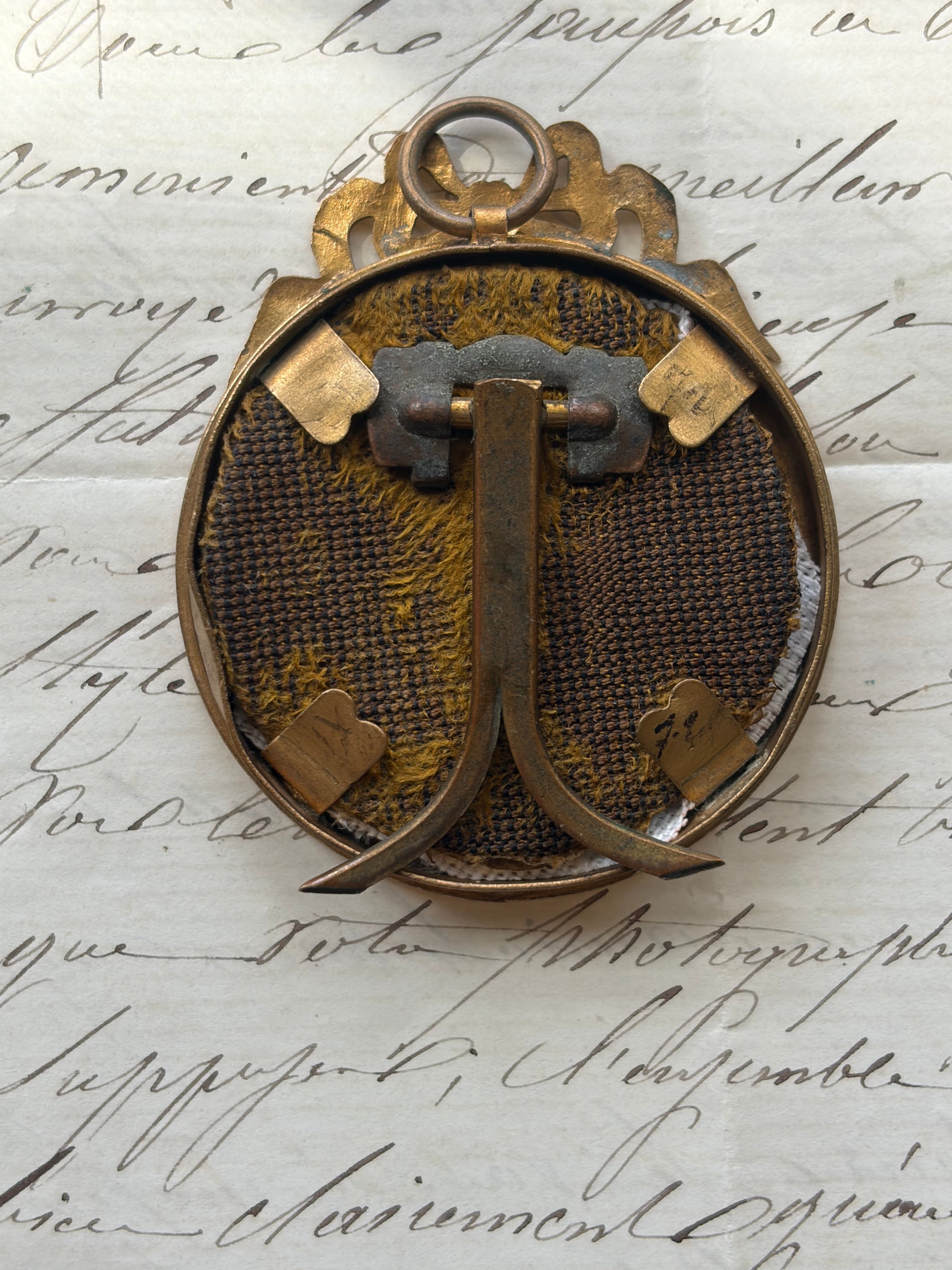 Antique French Gilt Brass Oval Frame with Bow Crest