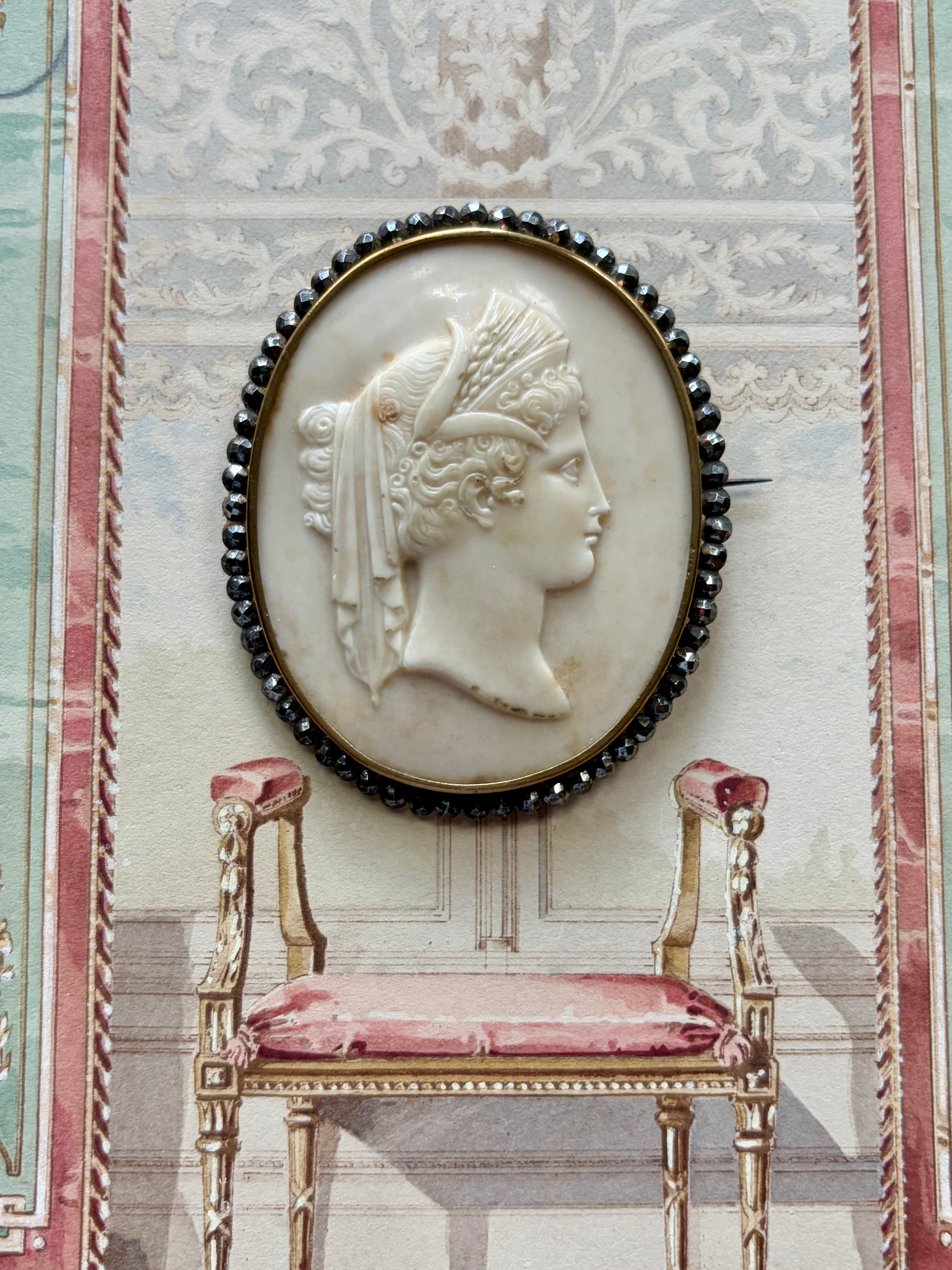 Antique Carved Lava Stone Cameo Brooch with Bead Border